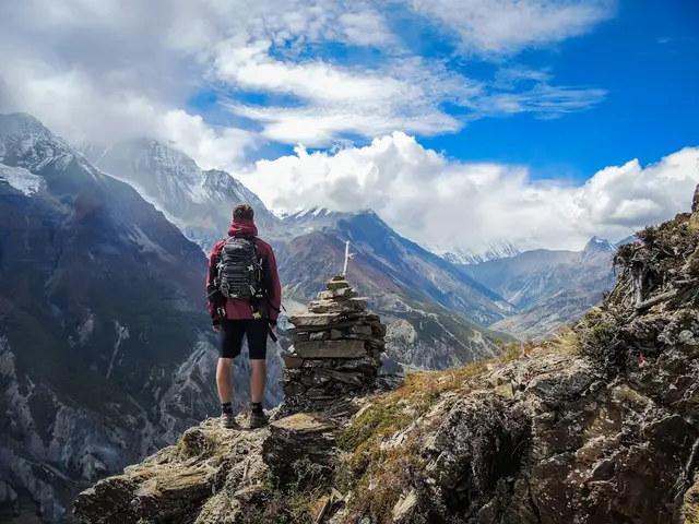 Solo hiker on a mountain trail